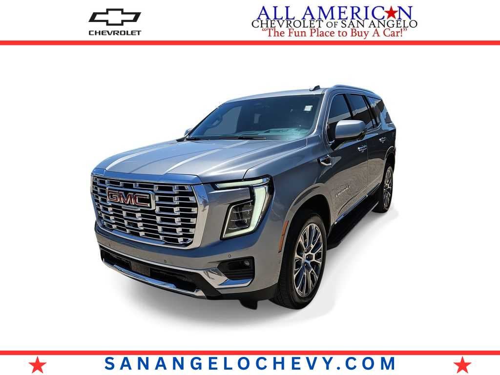 2025 GMC Yukon Denali in Sterling Metallic — front three-quarter view