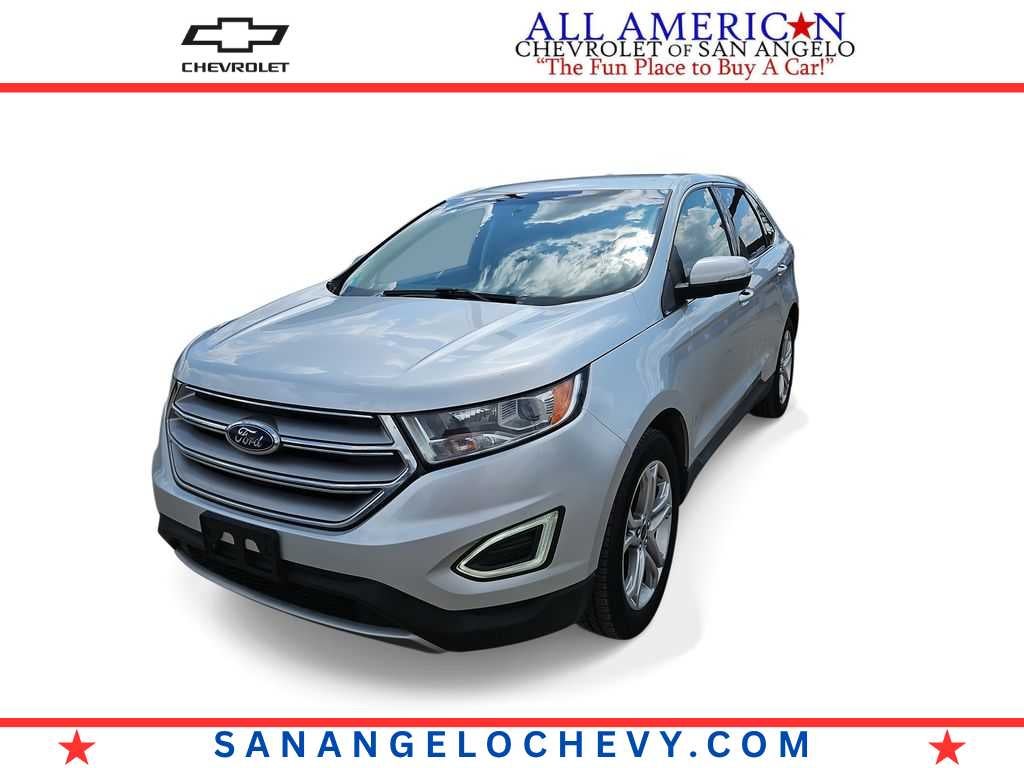2018 Ford Edge Titanium in Sil/Silver — front three-quarter view